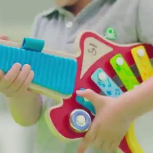 Hape 6-in-1 Music Maker | Colorful 6 Instrument Guitar Shaped Musical Toy for Ages 18 Months+