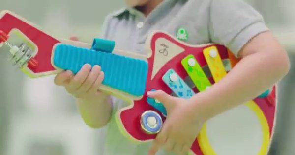 Hape 6-in-1 Music Maker | Colorful 6 Instrument Guitar Shaped Musical Toy for Ages 18 Months+
